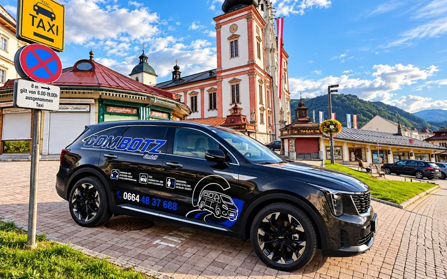 Kia Sorento mit GOMBOTZ-Beklebung am Taxistandplatz vor der Basilika Mariazell